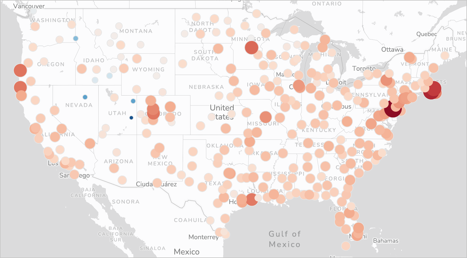 A map of the US with dots for each airport in the dataset. Airports that are more delayed are larger and darker red